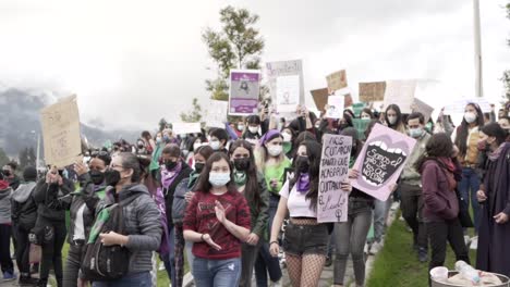 Women-and-men-are-marching-during-the-International-Women's-Day-in-Quito-Ecuador