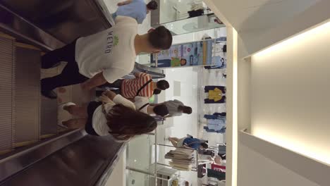 Shoppers-riding-the-escalators-inside-Metro-Department-Store-in-Ayala-mall-in-Cebu-City-Philippines