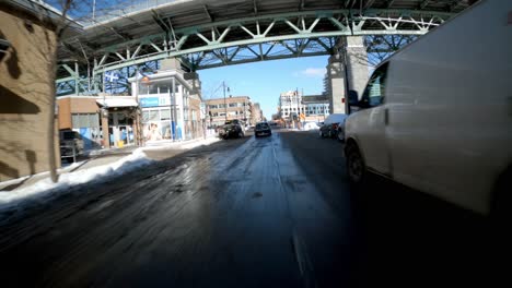 POV-Hyperlapse-Driving-Along-Icy-Roads-In-Island-Of-Montreal-On-Sunny-Day-With-Clear-Blue-Skies