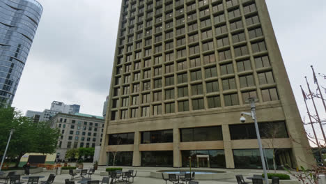 Tilt-Up-View-of-Administrative-Tower-Facade-and-Outside-Recreation-Public-Space-in-Downtown-Vancouver-City