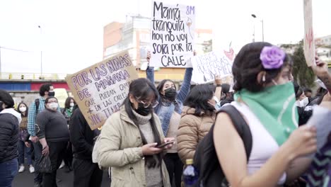 Women-are-getting-ready-to-start-the-protest-during-the-International-Women's-day-in-Quito,-Ecuador