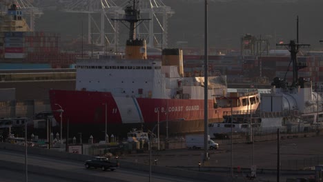 Seattle-WA,-US-Coast-Guard-Ship-in-Base,-Cargo-Shipment-and-Containers-in-Background