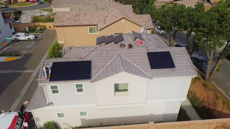 Technicians-Installing-Solar-Panels-On-House-Roof-In-Los-Angeles,-California