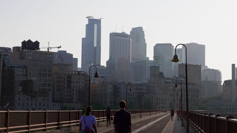 Pedestrians-Walking-Along-Bridge-in-Downtown-Minneapolis-City