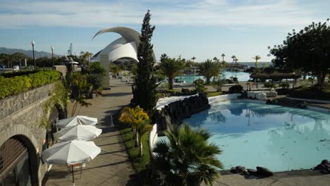 Parque-Maritimo,-Cesar-Manrique,-Water-Park-with-the-Auditorium-in-background,-Part-two