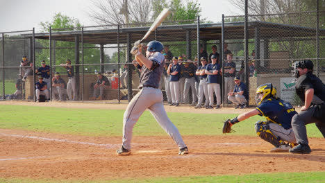 Slow-Motion-Shot-Of-Baseball-Player-Hitting-Hard-The-Ball-In-Baseball-Playing-Court,-Florida