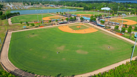 Players-Playing-Baseball-At-The-Field-Of-Lake-Myrtle-Sports-Park-In-Auburndale,-Florida