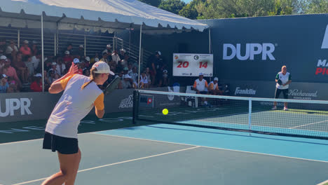 Intense-Female-game-ending-at-the-Major-League-Pickleball-tournament,-in-Newport-Beach,-California,-USA