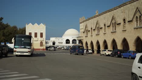 Streetview-with-parking-cars-near-the-harbour,-in-Rodos-Town