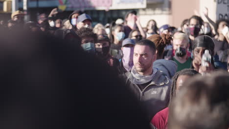 Young-protesters-raising-their-hands-in-the-air-at-BLM-Protest-in-NYC-slow-motion