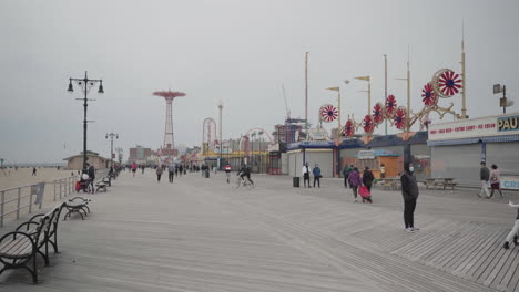 Wide-shot-of-deserted-boardwalk-on-Coney-Island-during-Coronavirus-outbreak