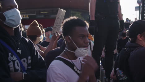 Youth-Protesters-shouts-take-a-knee-a-NYPD-officers-during-BLM-protest-in-NYC