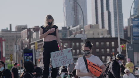 Female-protesters-in-a-crowd-in-downtown-Brooklyn-during-BLM-protest