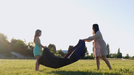 Mother-and-daughter-doing-a-picnic