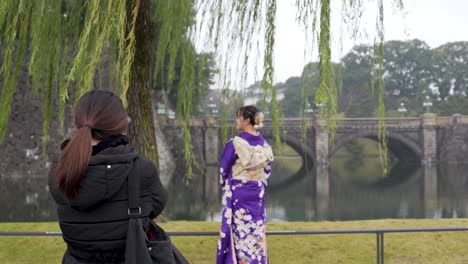 Photographer-Shoots-Geisha-in-Serene-Setting-Capturing-Elegance-taking-professional-photo