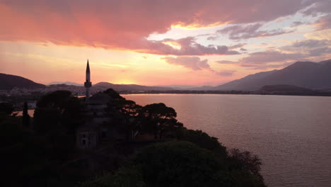 View-of-beautiful-medieval-Fethiye-mosque-in-Ioannina,-Greece-with-mausoleum-of-Ali-Pasha-at-sunset