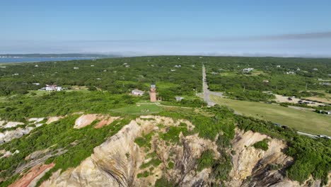 Wide-done-shot-orbiting-around-the-Gay-Head-Lighthouse-in-Martha's-Vineyard