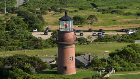 Aerial-shot-orbiting-around-the-Gay-Head-Lighthouse-in-Martha's-Vineyard,-Massachusetts