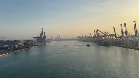 Point-of-view-of-the-seascape-and-Laem-Chabang-Port-against-the-background-of-a-soft-glow-sunrise-in-Thailand