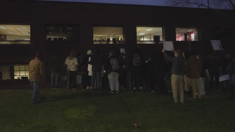 Students-at-Youngstown-State-University-in-Youngstown,-Ohio-Protest-the-recent-cuts-to-the-art-programs-at-the-Dana-School-of-Music-on-a-cold-night-in-January