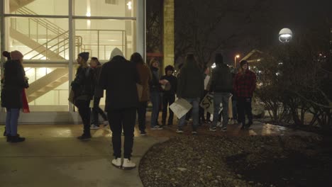 Students-gather-at-the-Dana-School-of-music-at-Youngstown-State-University-in-Youngstown,-Ohio-in-protest-of-the-cuts-to-the-music-programs