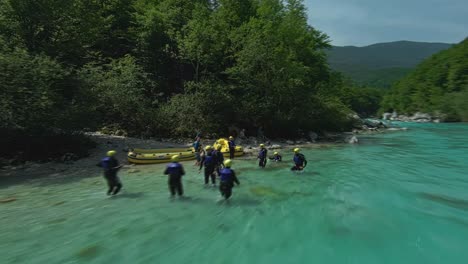 Soca-River-And-Rafters-Tourists-In-Slovenia---Aerial-FPV