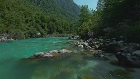 Soca-River-With-Tourists-In-Slovenia---Aerial-FPV