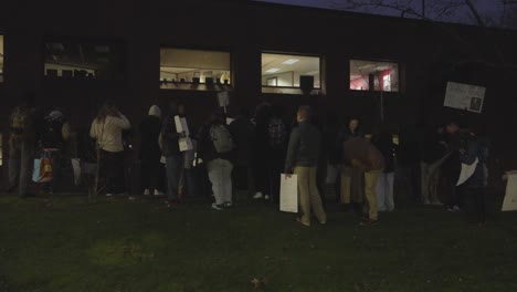 Students-at-Youngstown-State-University-in-Youngstown-Ohio-gather-at-the-Dana-School-of-music-hold-signs-in-protest-of-the-cuts-made-to-the-art-and-music-programs