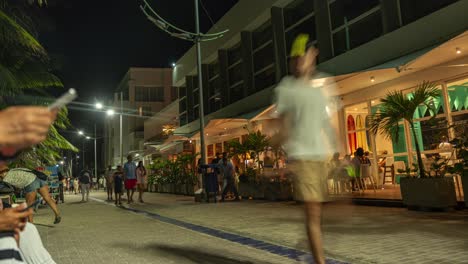 Timelapse-People-Walking-At-Beach-Sidewalk-At-Night