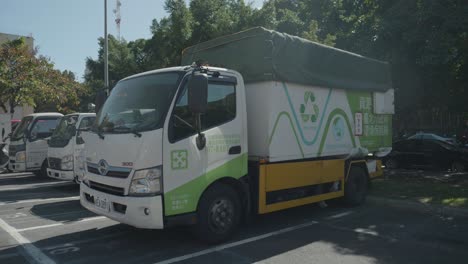 Closeup-Shot-Of-A-Recycling-Truck,-Waste-Disposal-Vehicle