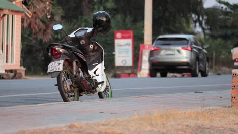 Motorbike-Parked-On-Roadside-In-Rayong,-Thailand