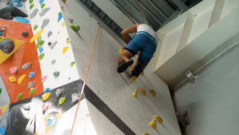 Man-in-a-climbing-wall-centre