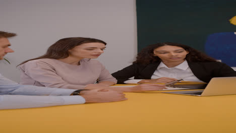 Clients-talking-with-female-real-estate-agent