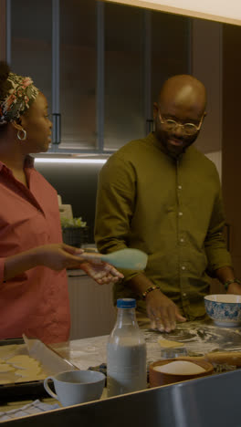 Couple-making-cookies