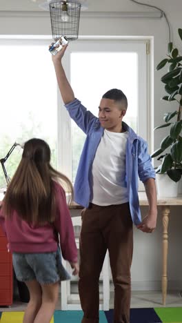 Girl-trying-to-reach-to-her-phone-from-friend's-hand