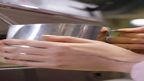 Female-barista-using-coffee-machine