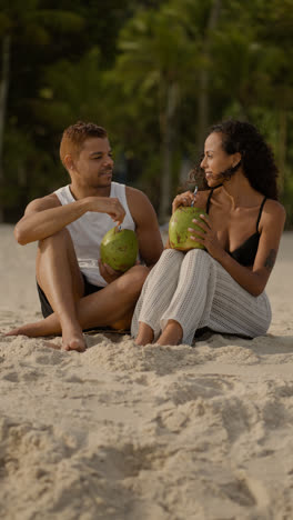 Couple-enjoying-coconut-drink