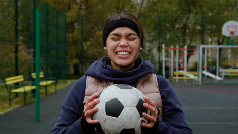 Woman-shouting-with-soccer-ball