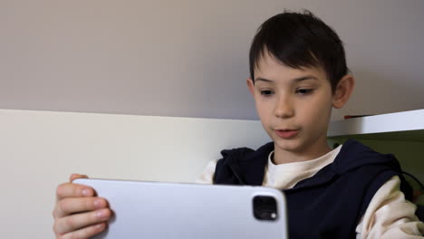 Teenager-using-tablet-at-home