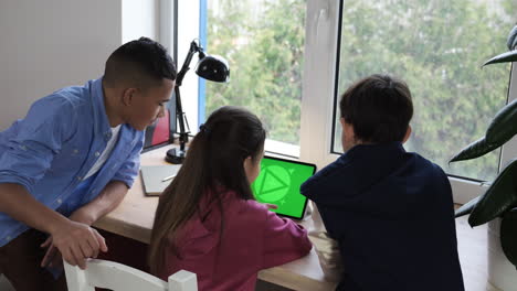 Friends-watching-tablet-in-the-bedroom