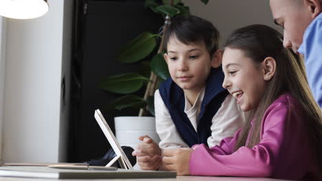 Friends-watching-tablet-in-the-bedroom