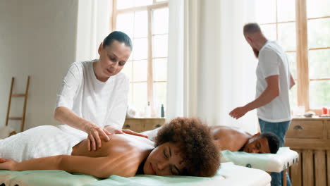 Two-clients-getting-a-couple-massage