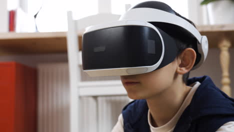 Young-boy-using-VR-glasses