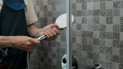 Plumber-fixing-shower-head