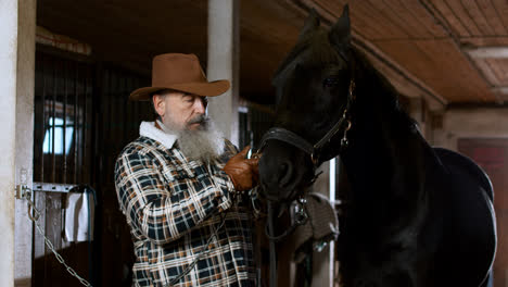 Man-with-horse-at-the-stables