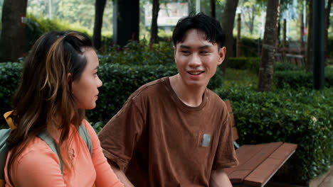 Boy-and-girl-talking-in-the-park