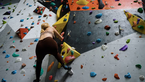 Woman-in-a-climbing-wall-centre