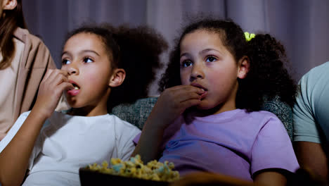 Kids-watching-film-at-home