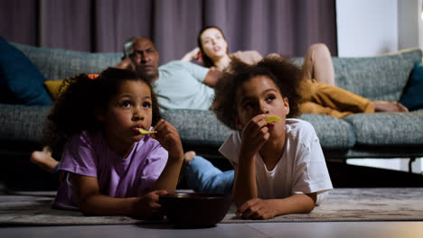 Family-watching-film-at-home