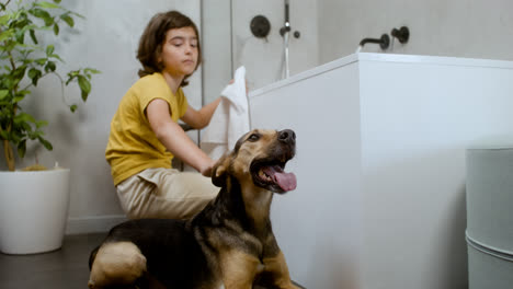 Girl-and-dog-at-the-bathroom